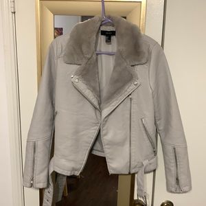 Faux leather jacket with fur lined neck and opening
